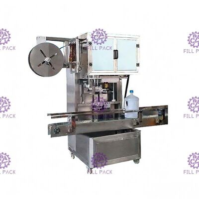 Un etichettatore capo elettrico della bottiglia rotonda della manica del cappuccio